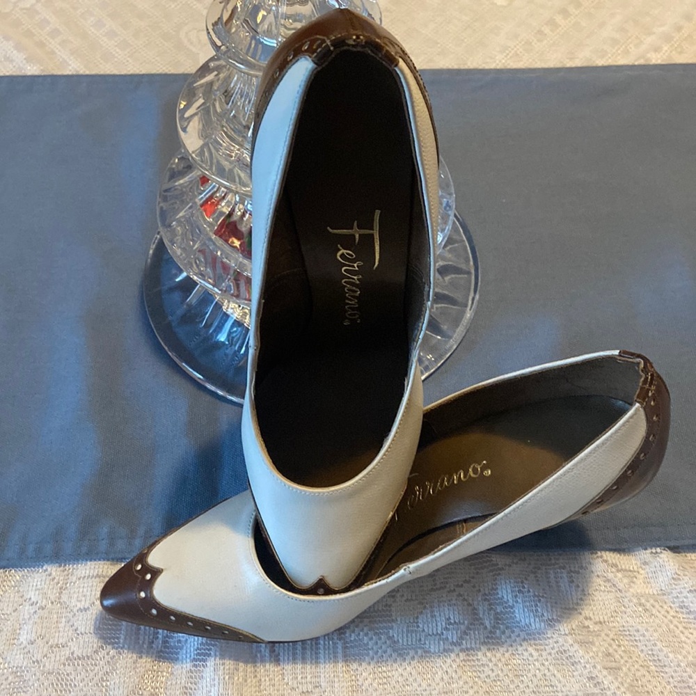 Vtg brown/white Ferrano heels.Brown toe leather tips and same accent on back.
